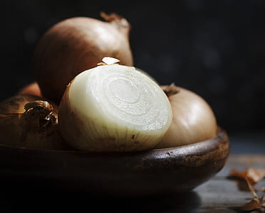 Brown Onion on Brown Wood Plate thumbnail