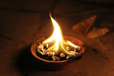 close-up photo of brown bowl with fire thumbnail