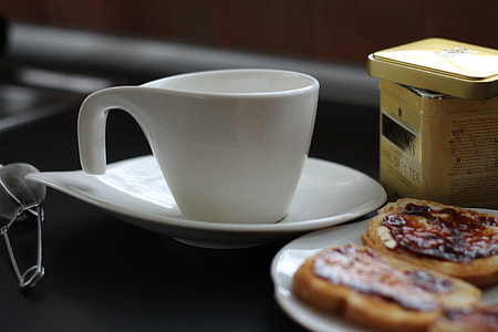 white ceramic cup on saucer thumbnail