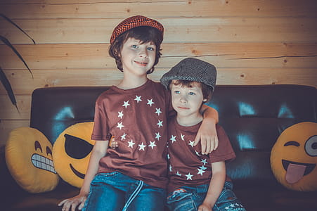 OTwo Boys Sitting on Sofa thumbnail