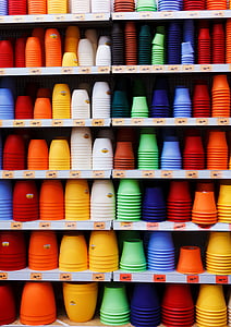 assorted-color plastic pot lot on shelf thumbnail