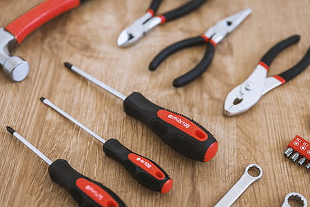 Construction tools on the wooden background. thumbnail