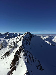 glacier mountain under clear blue sky thumbnail