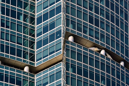 gray concrete multi-story building at daytime thumbnail