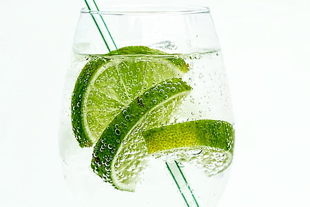 Soda With Lime on Clear Drinking Glass on White Surface thumbnail