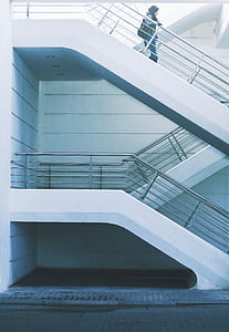 woman walking down staircase thumbnail