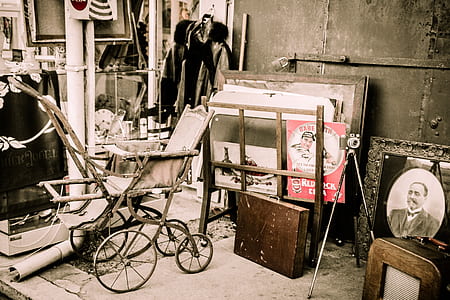 brown stroller beside wooden attache case thumbnail