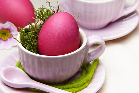 pink egg on white ceramic teacup thumbnail