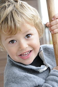 boy wearing gray sweater thumbnail