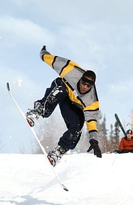man snowboarding during daytime thumbnail