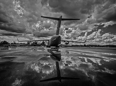 grayscaled photo of airplane thumbnail