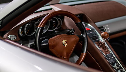 brown and black leather steering wheel thumbnail