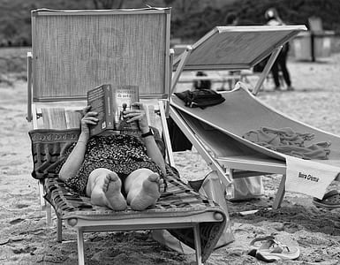 grayscale photography of woman on bed thumbnail