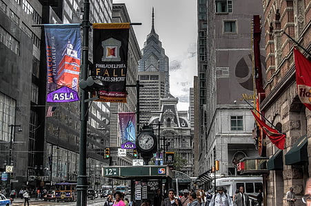 people on a busy street with tall buildings at daytime thumbnail