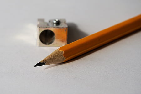 yellow pencil near stainless steel sharpener thumbnail