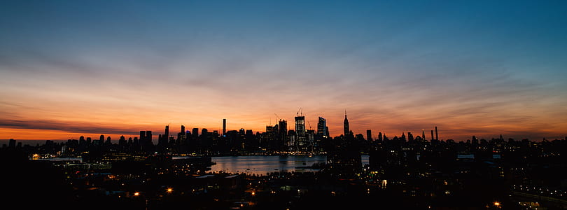 panoramic photography of high rise buildings thumbnail
