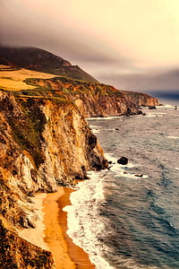 body of water near mountain thumbnail