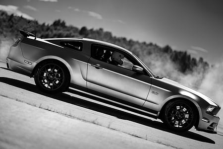 coupe in grayscale photography thumbnail