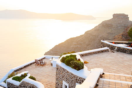 gray concrete terrace beside sea thumbnail