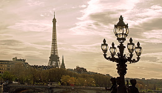 Eiffel Tower under cloudy sky thumbnail