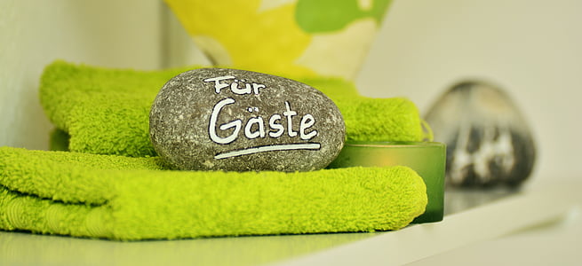 gray stone on green towel thumbnail