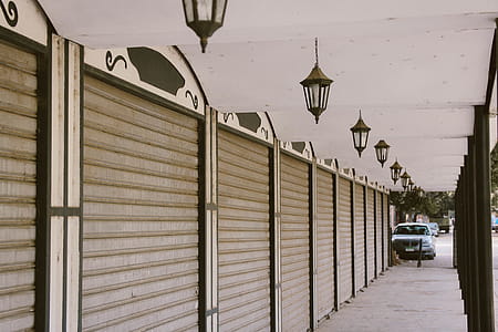 Wide Angle Photo of Gray Roller Shutters thumbnail