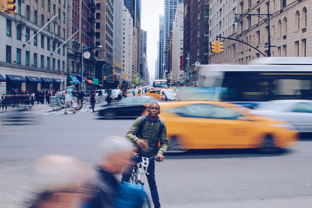 man riding bicycle on road thumbnail