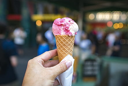 person holding cone soft cream thumbnail