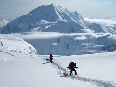 two person hiking on snow mountain thumbnail