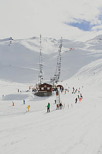 people in snow covered field thumbnail