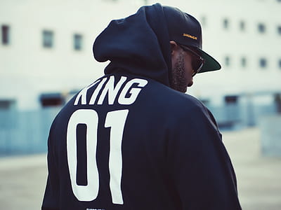 man wearing black cap and hoodie thumbnail
