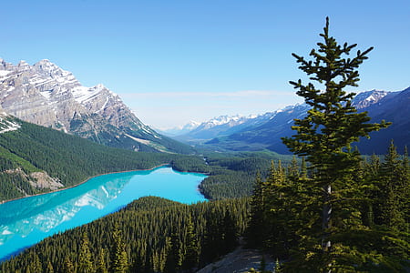 aerial view of blue lagoon near mountain thumbnail