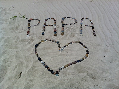 stone artwork on seashore thumbnail