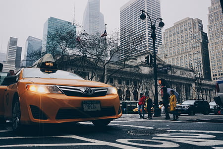 Yellow Toyota Sedan on in Highway Road thumbnail