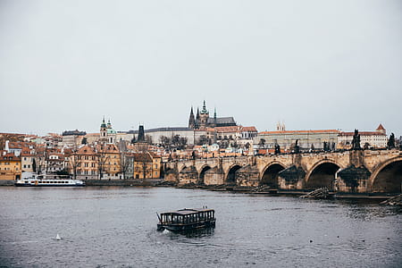 A panoramic view of Vitava river in Czech Republic with cityscape in the background thumbnail