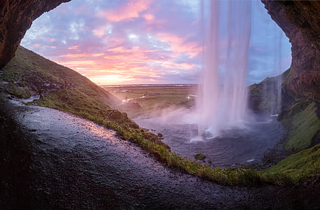 cave waterfalls during sunset thumbnail