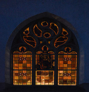 black and orange cathedral during night time thumbnail
