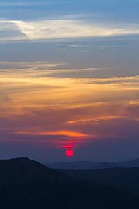 silhouette of mountains during sunset thumbnail