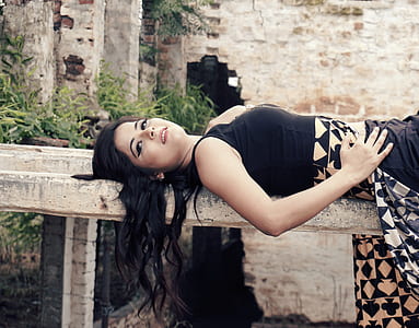 woman lying on concrete platform thumbnail