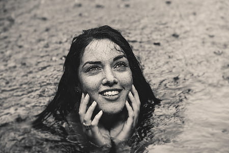 woman swimming during daytime thumbnail