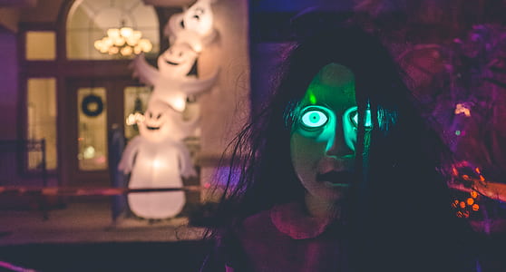 long haired Halloween decor with green eyes thumbnail
