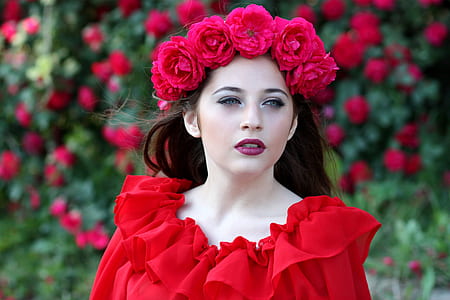 close-up photo woman in red top during daytime thumbnail