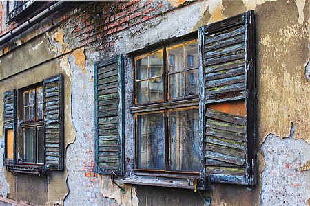 minimalist photography of brown wooden window house thumbnail