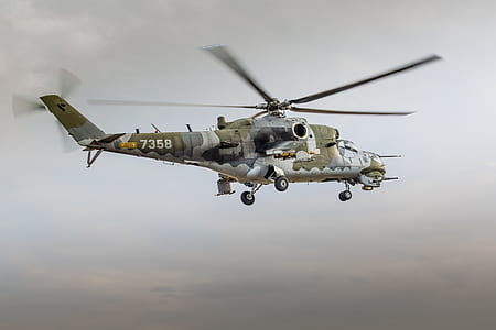 gray and green helicopter thumbnail