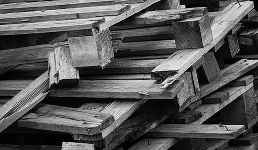 grayscale photo of wooden pallets thumbnail