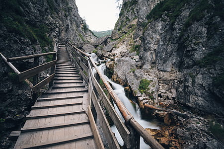 timelapse photography of water stream near brown wooden path thumbnail