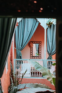 gray curtains near gray railings thumbnail