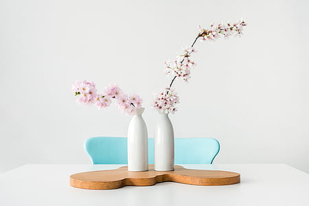 white and pink flowers in white ceramic vase thumbnail