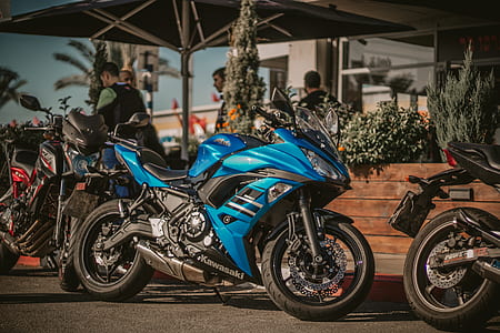 Photography of Motorcycles Parked on the Street thumbnail