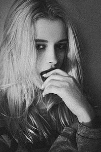 grayscale photo of woman thumbnail